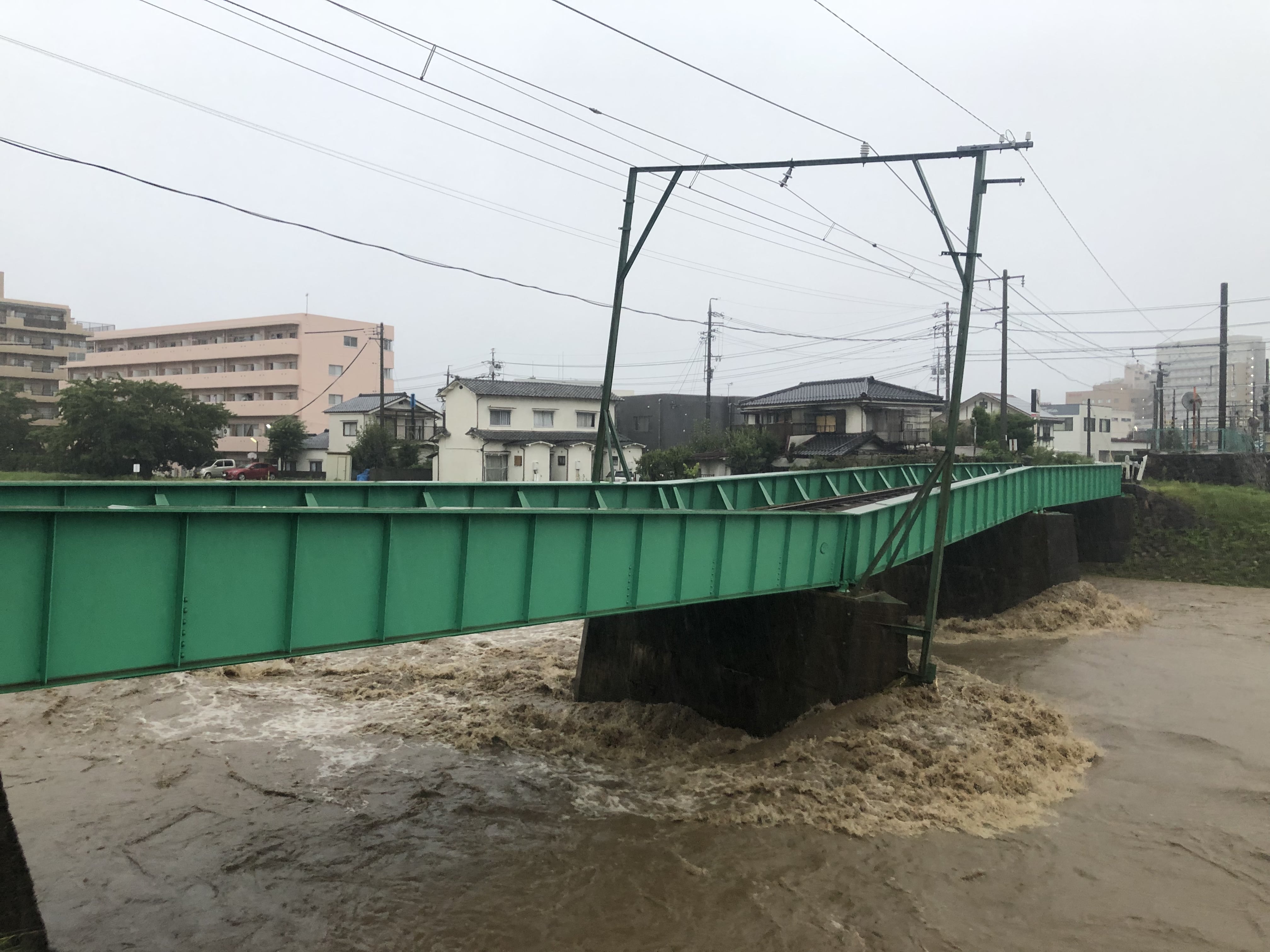 被災した当時の田川橋りょう　ⓒアルピコ交通株式会社